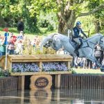 cross country horse and rider at water jump